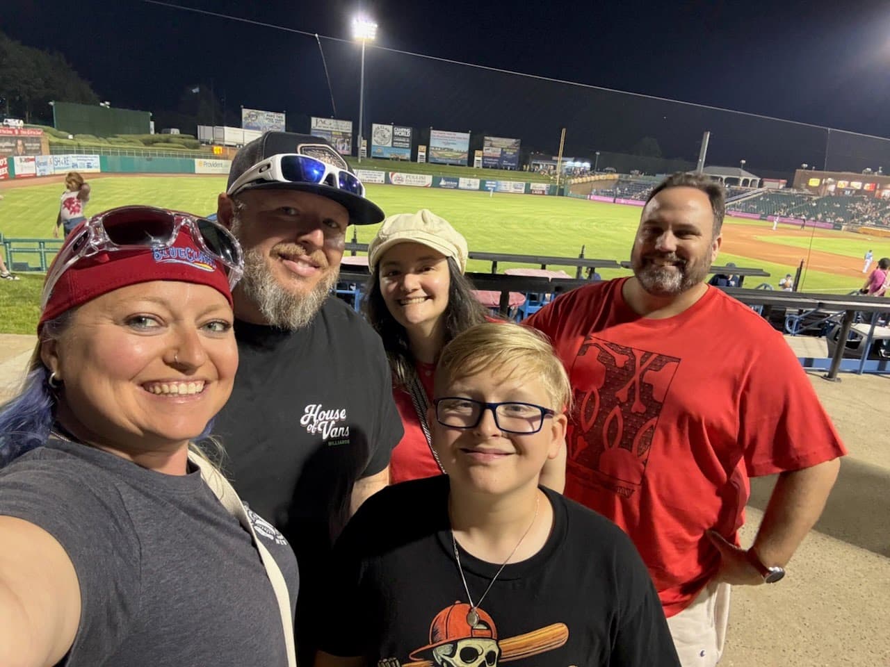 Ryan Michael Kelly with community members at a local event